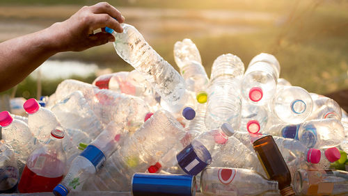 plastic bottles cans drinks coke beer soft drink recycling container deposit scheme environment incentive reward refund bonus nsw reverse vending machine