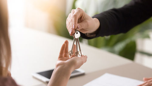 woman keys real estate agent investing in property retirement shortfall funding super superannuation investing investment investors property buyer expo ben kingsley