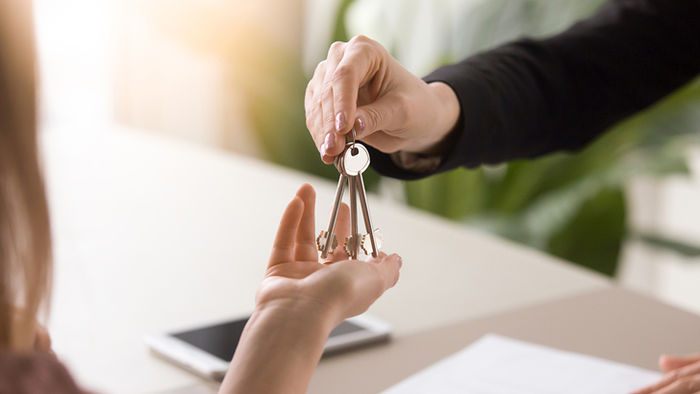woman keys real estate agent investing in property retirement shortfall funding super superannuation investing investment investors property buyer expo ben kingsley