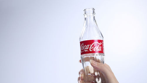 pain free ways to save cash money piggy bank budget notes coins coke bottle