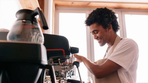 barista coffee shop cafe young man worker super budget 2018