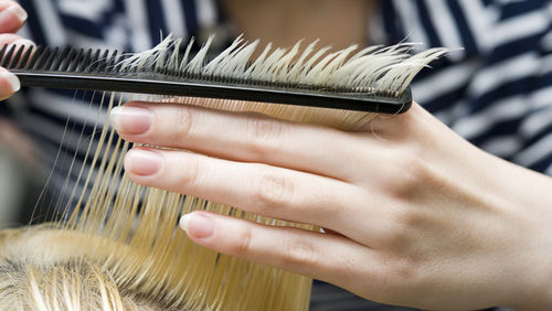 small business Sarah Morgan owns two Bladez Barbers salons in Queensland hair dresser card payment services