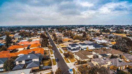 rea group property downturn