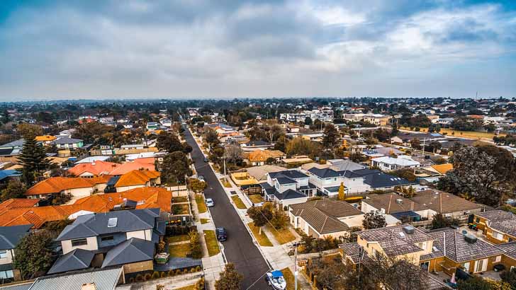 rea group property downturn