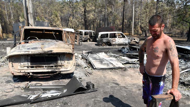 RAINBOW FLAT, AUSTRALIA - NOVEMBER 13: Danny Wearne surveys the bushfire damage to his property on November 13, 2019 in Rainbow Flat, Australia. Catastrophic fire conditions - the highest possible level of bushfire danger - have eased across greater Sydne