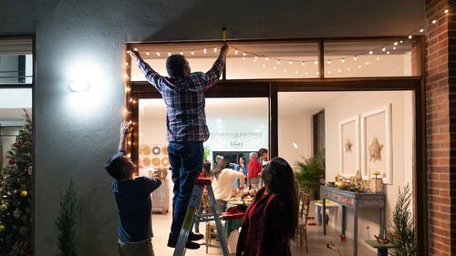 putting-up-christmas-lights.jpg