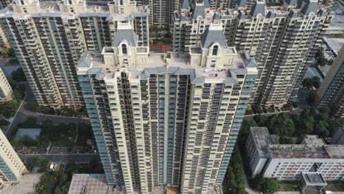 evergrande building collapse china will evergrande collapse affect australia asx australian sharemarket evergrande apartments