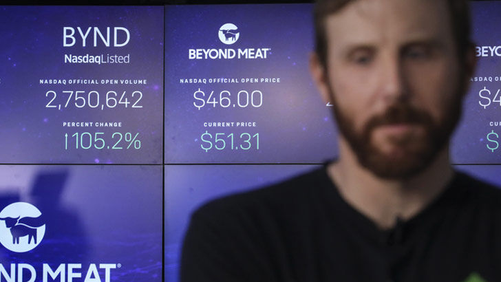 Beyond Meat CEO Ethan Brown speaks to a journalist after his company