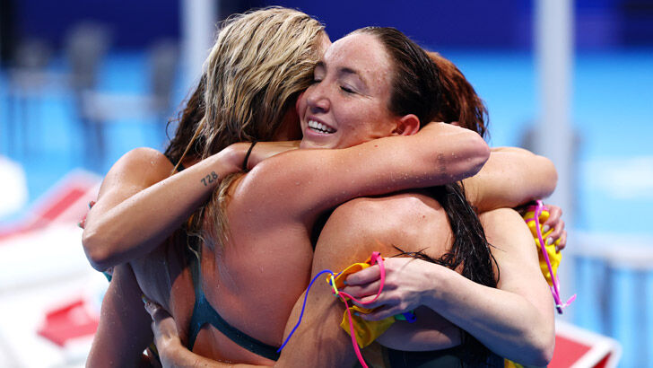 Lani Pallister of Team Australia embraces teammates after winning gold in the Women