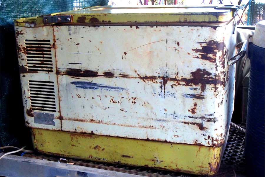 Old battered and dented Engel car fridge
