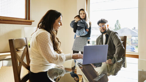 Australian family discussing estate planning and inheritance decisions at home