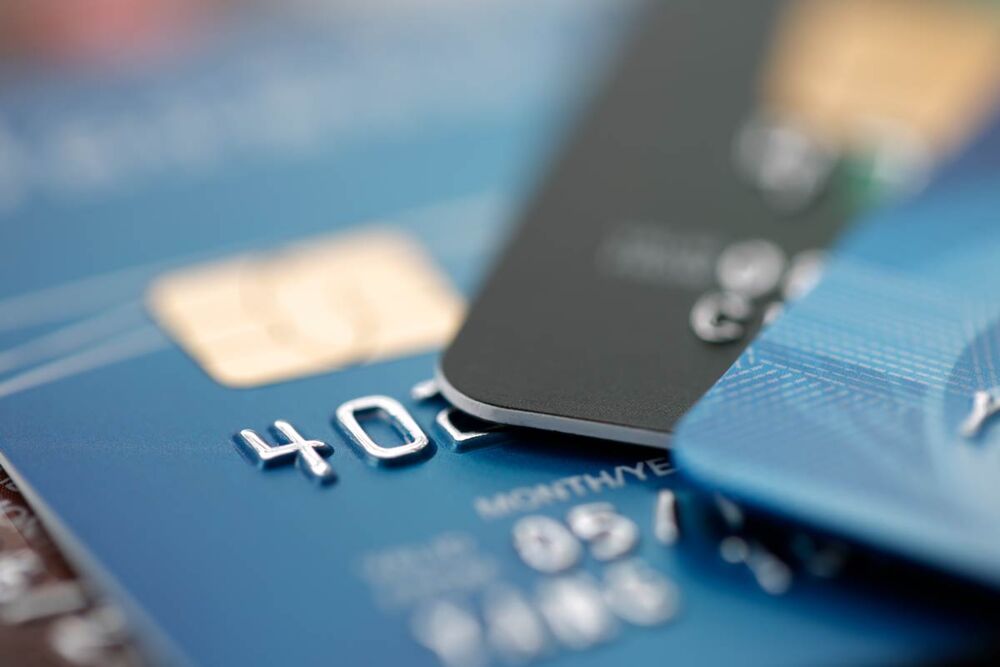Stack of credit cards representing Australian consumer borrowing