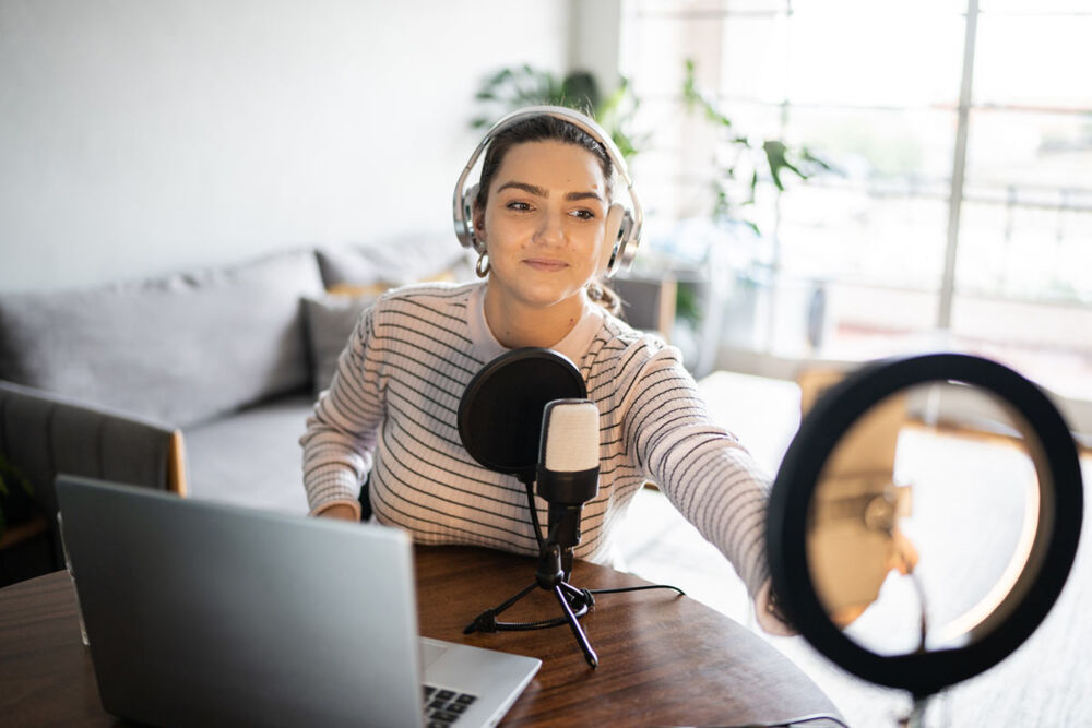 Finance influencer recording social media investing content