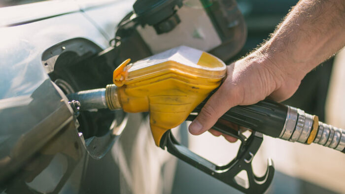 Australian motorist refuelling as fuel prices rise