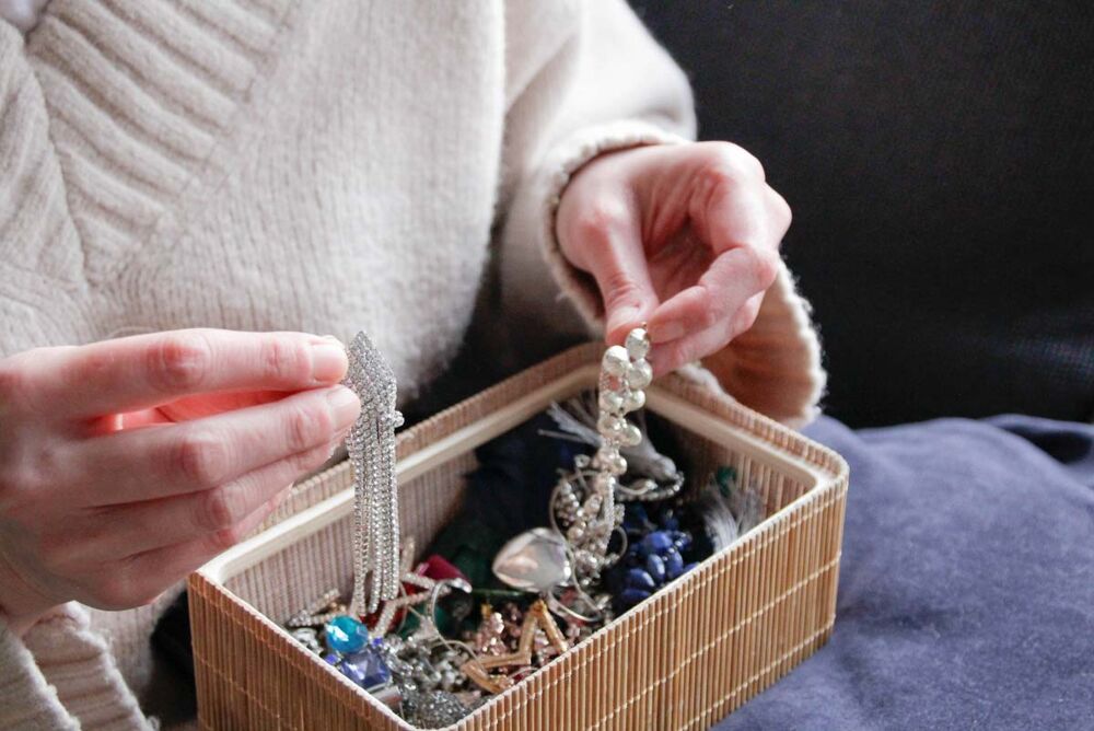 close-up of coins jewellery and small items with potential value