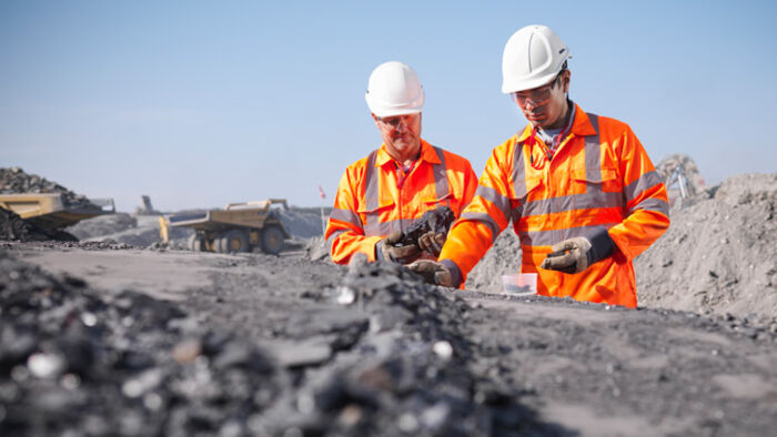 Australian investor reviewing superannuation balance as mining sector performance influences investment returns