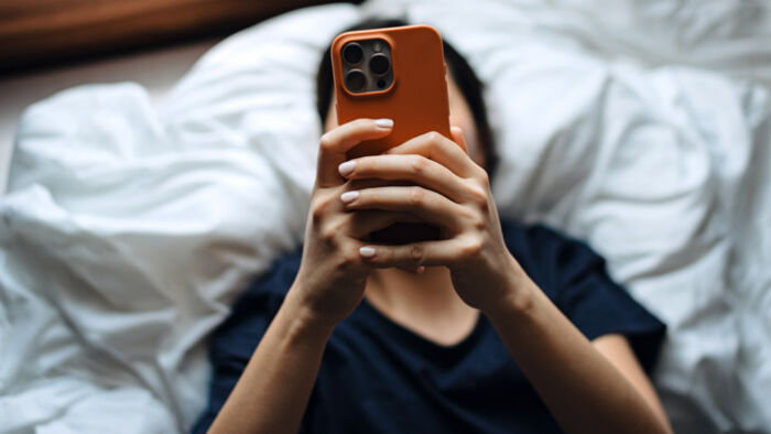 Young Australian watching financial advice videos on TikTok