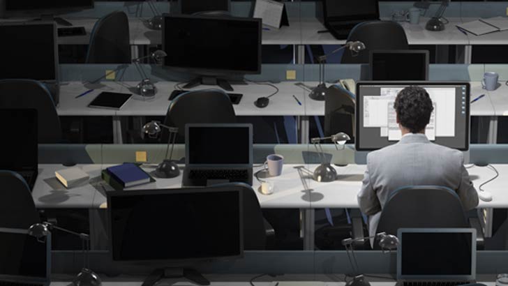 Australian office workers in a modern workplace, as economists watch labour market conditions and employment trends ahead of the latest jobs data release.