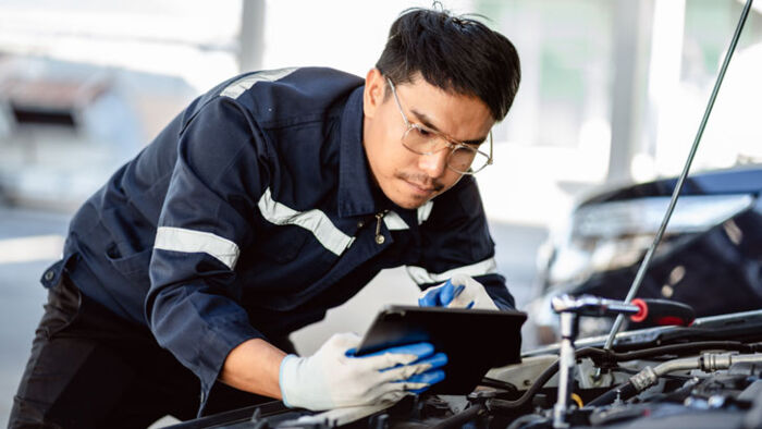 a mechanic performs an independent inspection before the car's warranty expires